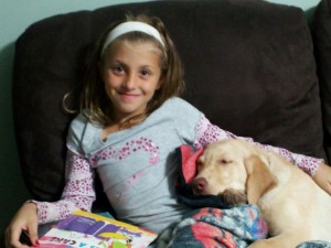 Gina Lintz cuddling with missing family pet, Dakota. 