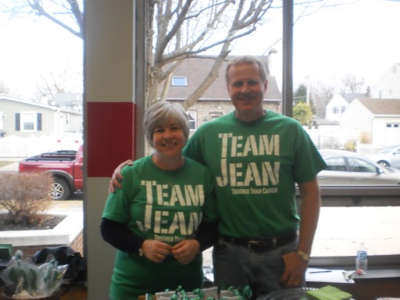 Terri & Paul Zuschnitt proudly wearing their "Team Jean" T-Shirts at Baked Goods Sale 