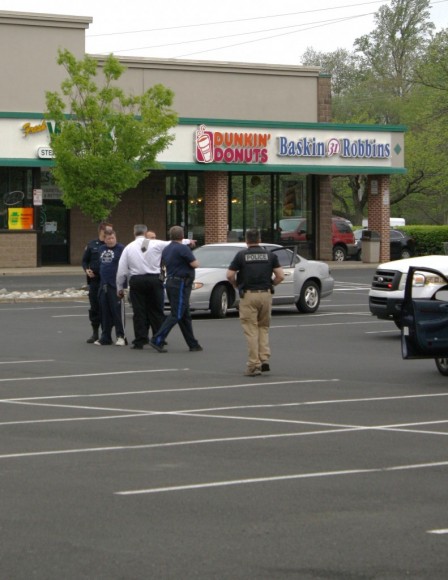 Phillip being taken into custody at a Northampton shopping center in 2011. Credit: Tom Sofield/LevittownNow.com