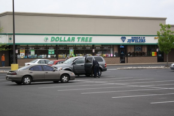 Investigators searching Phillip's gray SUV for weapons. Credit: Tom Sofield/LevittownNow.com