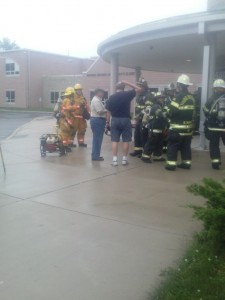 Fire officials gather outside of Synder-Girotti tonight. 