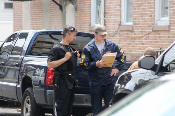 Police speak with a man at the scene. Credit: Tom Sofield/LevittownNow.com