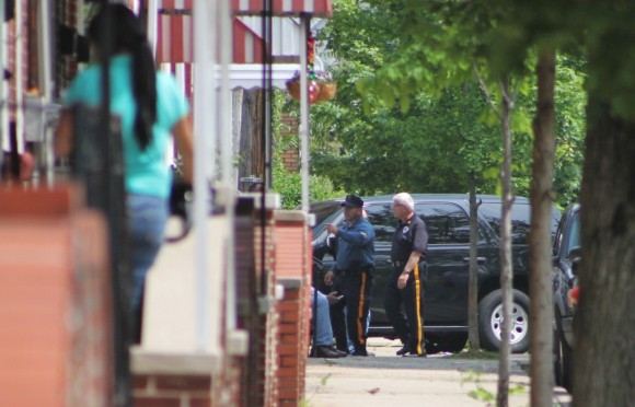 A resident watches police work the scene.  Credit: Tom Sofield/LevittownNow.com