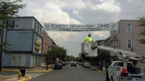 Borough Public Works Employee Checks Out Celtic Day Banner  Credit: Jeff Bohen-LevNow.com 