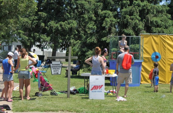 Folks enjoying the nice weather outside Penndel Borough Hall.  Credit: Tom Sofield/LevittownNow.com