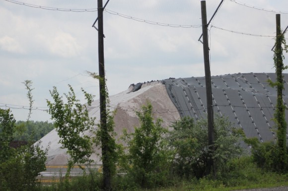 A large mound of rock salt bought by local municipalities in brought in to the port and stored. The salt is shipped in from Chile. Credit: Tom Sofield/LevittownNow.com