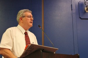 School Board President RIchie Webb outlining the contract before it was approved at a special meeting Thursday night. Credit: Tom Sofield/LevittownNow.com