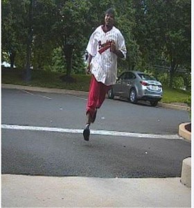 A surveillance photo of Michael Bell fleeing Credit: Bensalem Police