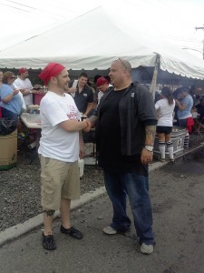 Dog & Bull Manager Andy Wells, thanking a community member for coming out to the Running of the Bull event.  Credit: Jeff Bohen -LevittownNow.com 