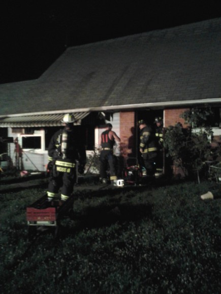 Fire officials surveying fire damage to home in Junewood. 