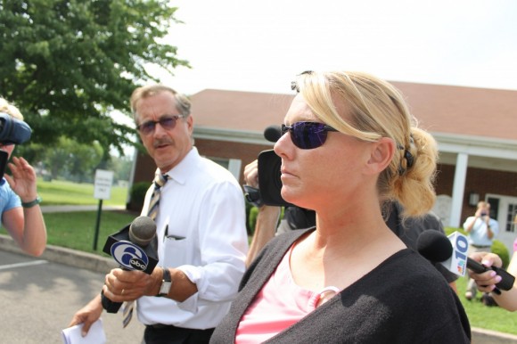 Lorie Bendorovich walking out of district court.  Credit: Tom Sofield/LevittownNow.com