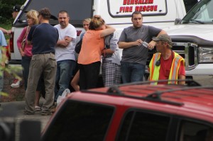 Friends and family of the victims Wednesday morning. Credit: Tom Sofield/LevittownNow.com