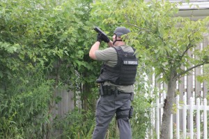 A US Marshal during a 2013 fugitive arrest in Levittown. File photo. Credit: Tom Sofield/LevittownNow.com