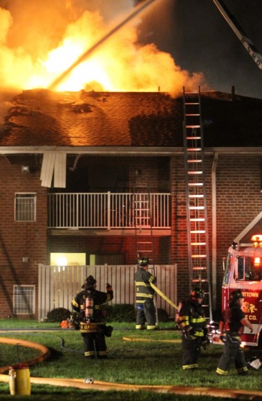 FIrefighters battle the massive fire. Credit: Tom Sofield/LevittownNow.com