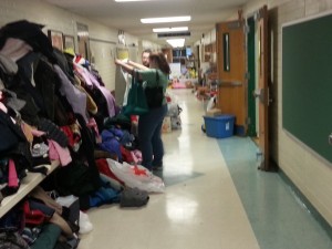 Patrick Springman and wife Audrey sort through donated winter coats. The Springmans lost everything in the Friday night fire. Credit: Dave Sommers/LevittownNow