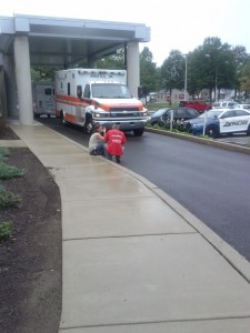 Family outside Lower Bucks Hospital as a helicopter transports the boy to CHOP. Credit: Jeff Bohen/LevittownNow.com