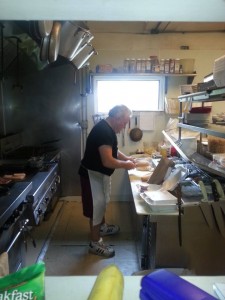 Bill Krause cooking and serving up tasty delights for customers of the Tullytown Pub & Grille