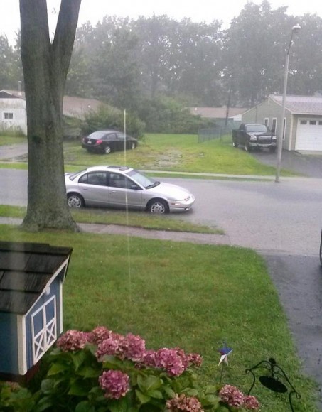 Water filled the roadway in Thornridge. Credit: Neal K Sanderson/Submitted