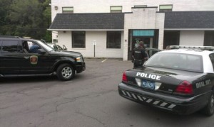 Law enforcement outside the courthouse as they prepared to transport the suspect. Credit: Tom Sofield/LevittownNow.com