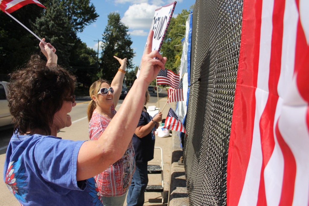 Protesters Wave Flags, Display Signs Against Obama in Middletown