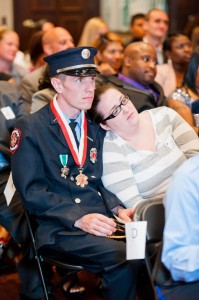 The Lt and his wife look on as Valor Awards are presented.