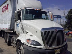 Frontal view of damage to 18 Wheeler that overturned on Friday morning in Bristol.