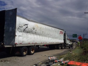 Side View of Damage to Tractor Trailer from tipping over on Friday Credit: Jeff Bohen/LevittownNow