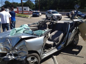 A photograph of the roof ripped of the car.  Credit: Submitted