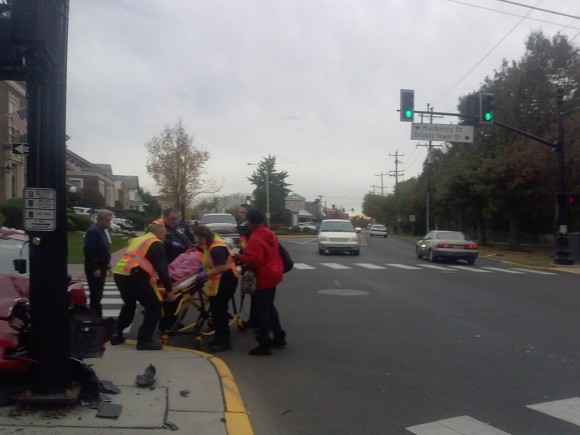 Medics after taking the injured woman from the car. Credit: Jeff Bohen/LevittownNow.com