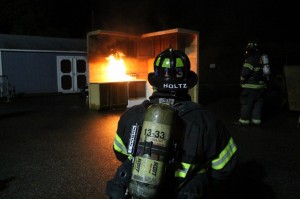 Firefighters stand by at a kitchen fire demonstration. Credit: Tom Sofield/LevittownNow.com