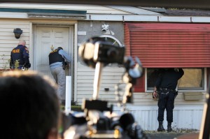 Police check a empty trailer home for squatters. Credit: Tom Sofield/LevittownNow.com
