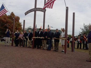 Officials cutting yellow ribbon at creremony on Saturday.  Credit: Jeff Bohen LevittownNow