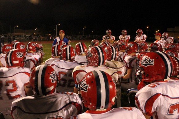 Neshaminy head football coach Mark Schmidt speaks with his players following their game. Credit: Tom Sofield/LevittownNow.com