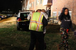 Family embraces moments after learning of the killings. Credit: Tom Sofield LevittownNow.com