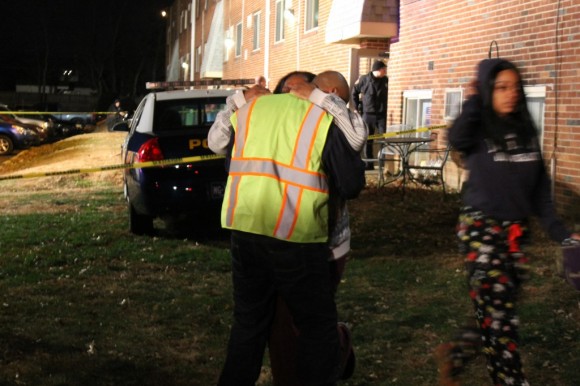 Family embraces moments after learning of the double murder. Credit: Tom Sofield LevittownNow.com 