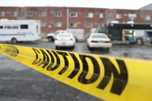 Crime scene tape outside the 600 building at the Avalon Courts Apartments in Bristol Township.  Credit: Tom Sofield LevittownNow.com 