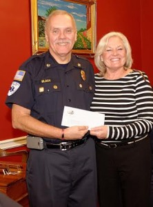 Fire Chief Herb Slack receives check from Robyn Trunell, Bristol Borough Council Vice-President.