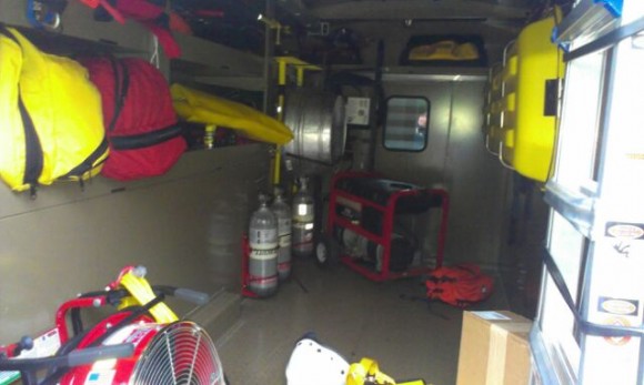 Equipment is still being loaded in the new vehicle.  Credit: Tom Sofield/LevittownNow.com