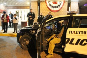 Police Chief Daniel Doyle sitting behind the wheel of a squad car at the Support Tullytown PD rally. Credit: Tom Sofield/LevittownNow.com