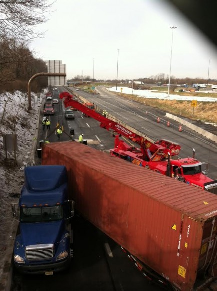 Crews clearing the highway. Credit: Tim Pristatskiy/Code 3 Photography