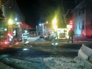 Bristol Fire Company 51 Firefighter's pulling a ladder off later used to get to the 2nd floor of the Otter St residence. Credit: Chelle Auty