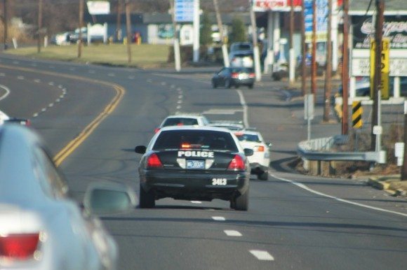 Police heading to the Ace Motel. Credit: Tom Sofield/LevittownNow.com
