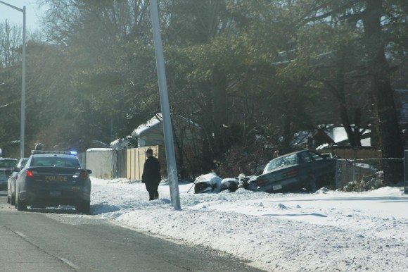 A compact car went off Mill Creek Parkway in Bristol Township. The car struck a fence and wood pile that belonged to a residence in Levittown's Oaktree section. The crash happened shortly after 2 p.m. No further information was available as of press time. Credit: Tom Sofield/LevittownNow.com