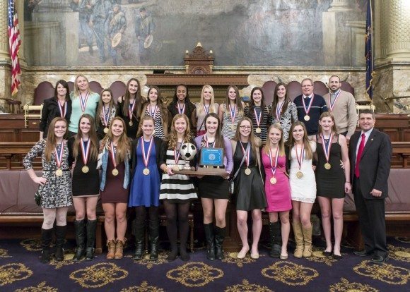 Rep. Frank Farry (R-Bucks) Monday welcomed the Neshaminy High School Girls’ Soccer Team and its coaching staff to the state Capitol, where they were honored in the House of Representatives for capturing their first state title in the 2013-14 PIAA Class AAA state championship game held in November at Hersheypark Stadium. Credit: Submitted
