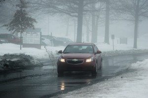A car hits a pothole in Middletown last year. Credit: Tom Sofield/LevittownNow.com