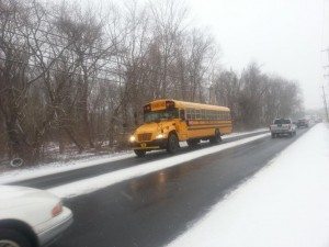 Traffic moves along a partially snow-covered Bath Road. Credit: LevittownNow.com
