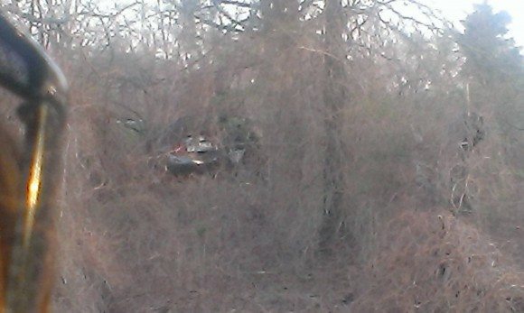 The wreckage of the car in the wooded area. Credit: Scott Unruh/Submitted