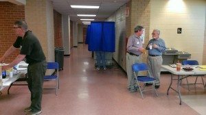 A voter in a booth at Neshaminy High School. Credit: Tom Sofield/LevittownNow.com