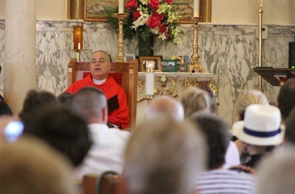 Father Tom Morris talking Sunday. Credit: Tom Sofield/LevittownNow.com