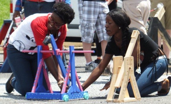 Students watch after a golf ball is projected from their catapult. Credit: Bristol Township School District